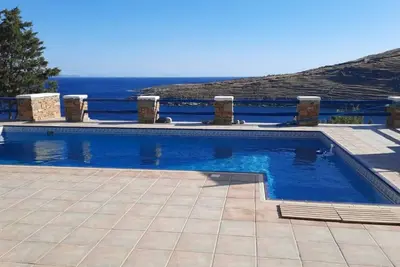 Image de Cycladic House with a Pool. Exceptional views and 2min walk from the beach.