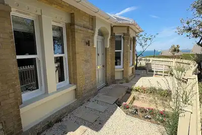 Image de Renovated Historic Bungalow with sea views, five minutes to the beach and town.