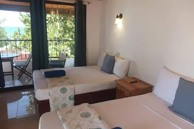 Image de Beach Front 1-bedroom apartment with WiFi, Ac in fantastic Punta Rucia