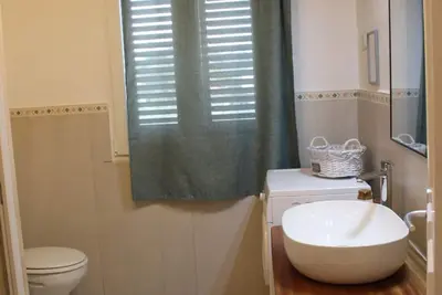 Image de Marzellinu, spacious apartment 1km from the sea.