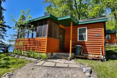 Image de Classic Minnesota Lakefront Cabin - Private Beach & Resort Amenities