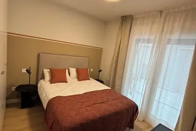 Image de Apartment two minutes from the Cathedral! Ideal for families, with patio.