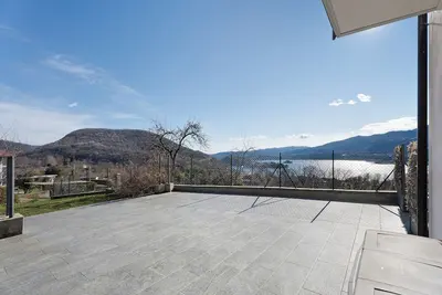 Image de Appartement \"Sole\" avec vue sur le lac, piscine partagée et Wi-Fi