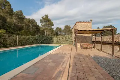 Image de Maison de campagne 'Can Pere Martí' avec piscine privée, terrasse privée et Wi-Fi