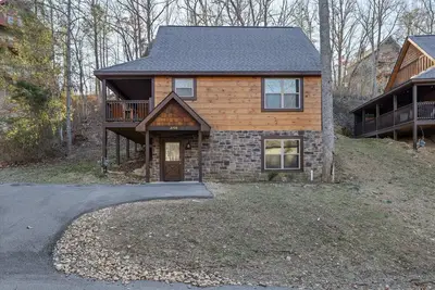 Image de This cabin is a 3 bedroom(s), 2 bathrooms, located in Pigeon Forge, Tn.