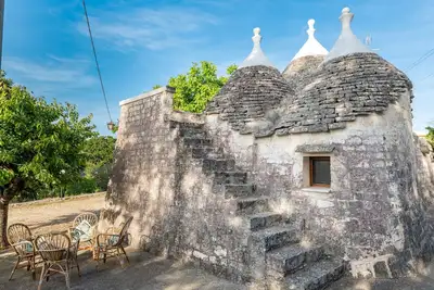 Image de Trullo 'Dona Filomena' avec terrasse privée, jardin privé et Wi-Fi