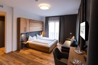 Image de Style multi-bed room with balcony - Familiengut Ertlhof