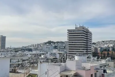 Image de Cozy apartment near metro-Athens view