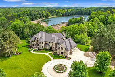 Image de Gray Lake Villa | Sleeps 22 · Theater · Sauna · Lake