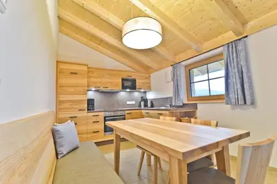 Image de Cozy vacation apartment (70sqm) on the 1st floor with private balcony and exposed roof trusses