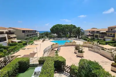 Image de Face à la mer! Top appartement, belle vue mer et grande piscine. Coup de coeur!