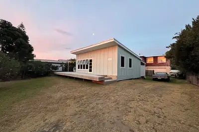 Beautifully updated 1950s bach just a few minutes walk from the surf beach.