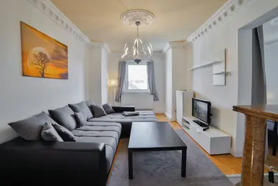Image de Exclusive apartment in historic residential building with fireplace, bathroom & plenty of space