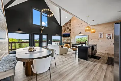 Image de Lakefront home with retro accents, private pool, and private dock.