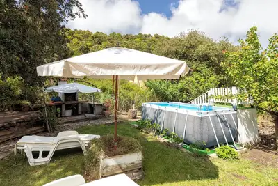 Image de Maison de vacances 'La Casa Nel Bosco' avec piscine partagée, Wi-Fi et climatisation