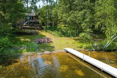 Image de Whispering Woods- Spacious 5 bedroom home with sandy frontage near Spooner, Wi.
