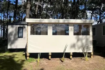 Image de Mobil home Confort plus - 27m² - 2 chambres + convertible - terrasse couverte 4 à 6 personnes - 4 pers. inclus dans le tarif