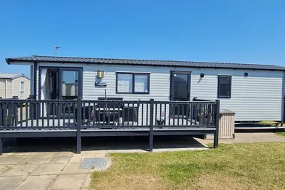 Image de Mikey Cabin Sleeps 8 with Balcony