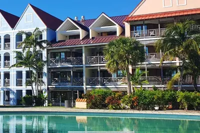 Taino Beach Bahamas 1 or 2 bedroom suite poolside with covered patio