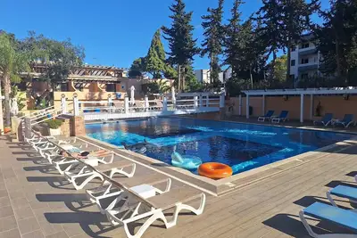 Image de Appartement \"Sun and Serenity\" avec piscine partagée, jardin partagé et Wi-Fi