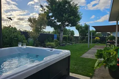 Image de 3 Queen beds, Hot Tub, Air Conditioning.