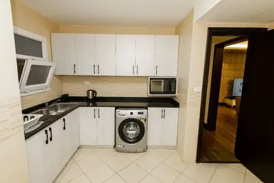 Image de Spacious 4-bedroom apartment Pool View Near the Airport