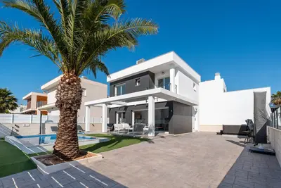 Villa 'Casa Bos Palm Tree with Pool' avec piscine privée, Wi-Fi et climatisation