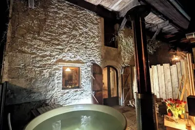 Image de Magnifique corps de ferme avec bain nordique privé