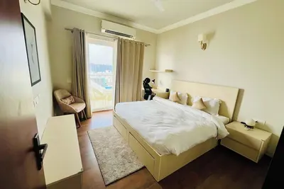 Image de Nature's Nook: Cozy, serviced luxury apartment in Gurgaon with WiFi, Ac, gym