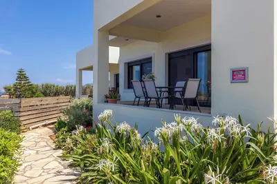 Image de A comfortable, fully equipped family house. Literally 50 steps from the sea.