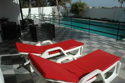 Image de Studio C avec balcon et vue sur la mer et le jardin
