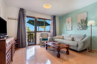 Image de Vacances 'Oasis Bahia Fronte Piscine' avec piscine partagée, terrasse privée et Wi-Fi