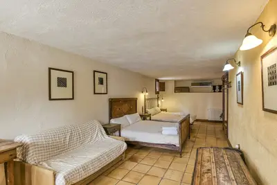 Image de Chambre \"Llevant\" avec piscine partagée, Wi-Fi et climatisation