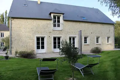 Image de Maison familiale et spacieuse à 10 min de Bayeux et Omaha