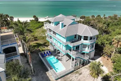 White Pelican Watch- Unobstructed views, on beach, heated pool, slip New Listing