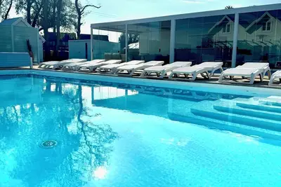 Image de Resort nowoczesnych domków wakacyjnych- dwa podgrzewane baseny, plac zabaw, bar!