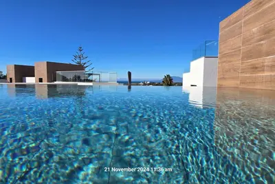 Image de Brand new designer apartment with private pool