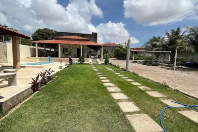 Image de Airy house with swimming pool, 5 minutes from Farol beach. The perfect getaway!