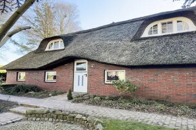 Image de Ferienwohnung im Reetdachhauses, Burhave