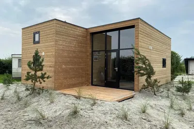 Image de Tiny house with 2 sleeping lofts and cosy living room