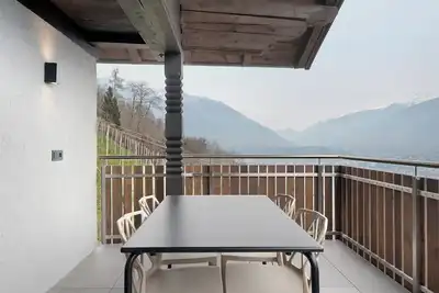 Image de Appartement 'Rosalia' avec vue sur les montagnes, piscine partagée et Wi-Fi