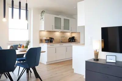Image de BeltBlick 4 - Moderne Ferienwohnung direkt am Strand mit Sauna und Meerblick!