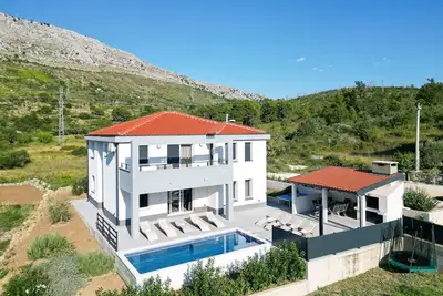 Image de Maison pour la famille avec la piscine Srinjine, Split (K-23770)