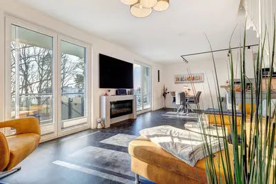 Image de Relax in a modern maisonette apartment with a view of the lagoon