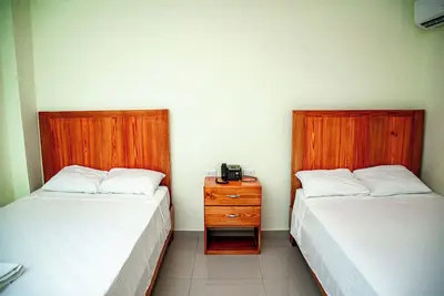 Image de Chic hotel in Punta Cana (room with 2 double beds).