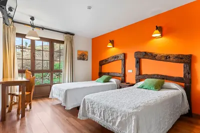 Image de Chambre 'El Nogal' avec piscine partagée, jardin partagé et Wi-Fi