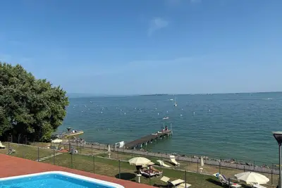 Luxury apartment in residence Gardazzuro with pools, directly on Lake Garda