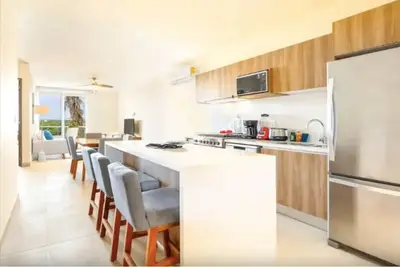 Charming 2-bedroom condo in delightful Akumal with Ac, fitness room, WiFi