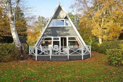 Image de Tent roof house with large terrace and W-Lan - - a few minutes to the beach -