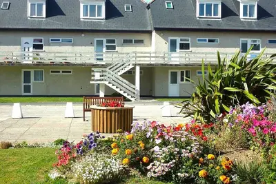 Image de Beach front apartment with direct beach access!